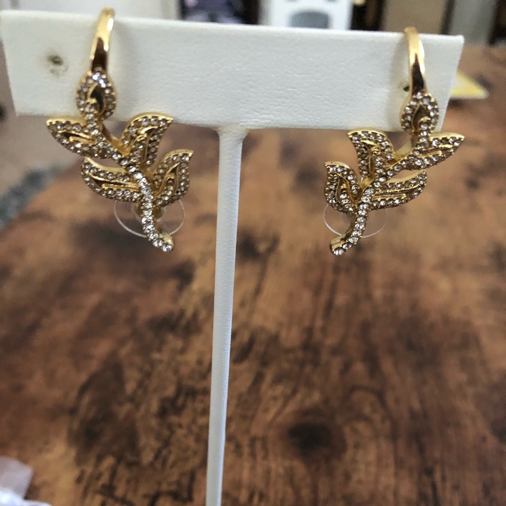 Pierced/ear crawler gold/crystal leaf earrings.